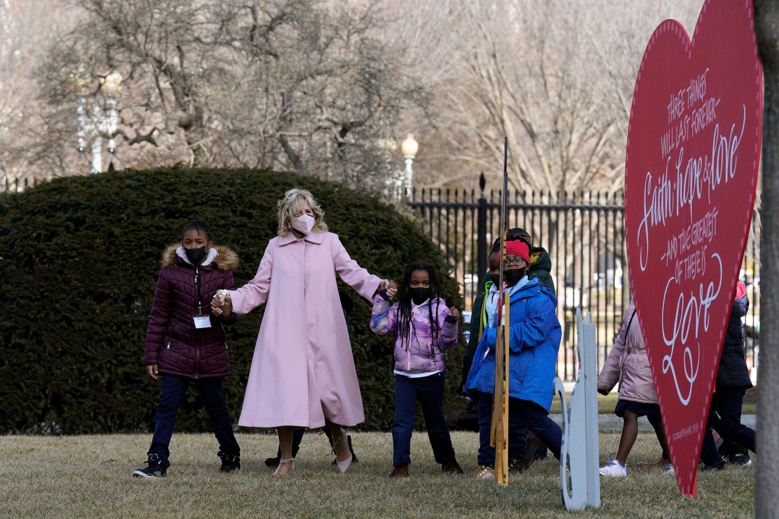 PHOTO: First lady Jill Biden walks with second graders from a DC elementary school to celebrate Valentines Day on the North Lawn at the White House in Washington, D.C., Feb. 14, 2022.