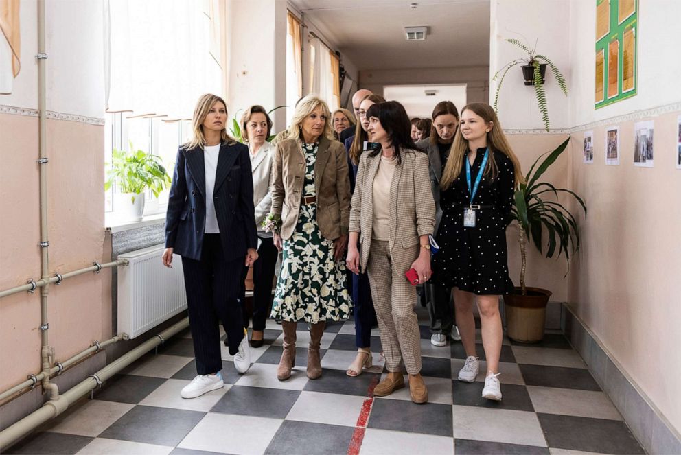 PHOTO: First Lady Jill Biden, center, and Ukrainian First Lady Olena Zelenska, left, are shown during a visit to an internally displaced persons center at School #6, May 8, 2022, in Uzhhorod, Ukraine.