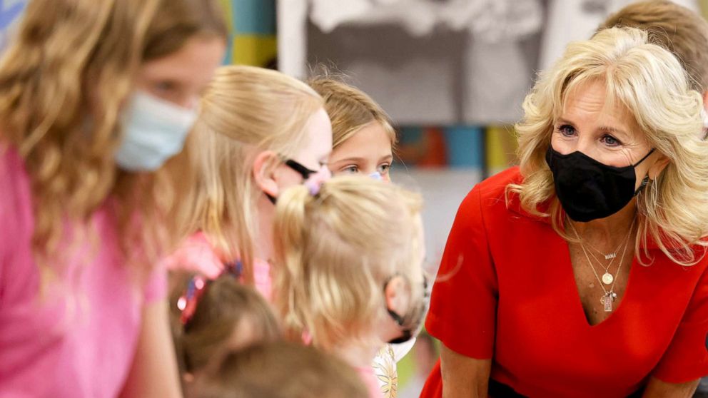PHOTO: First lady Jill Biden meets with children as she visits a pediatric COVID-19 vaccination clinic at Franklin Sherman Elementary School in McLean, Va, Nov. 8, 2021. 