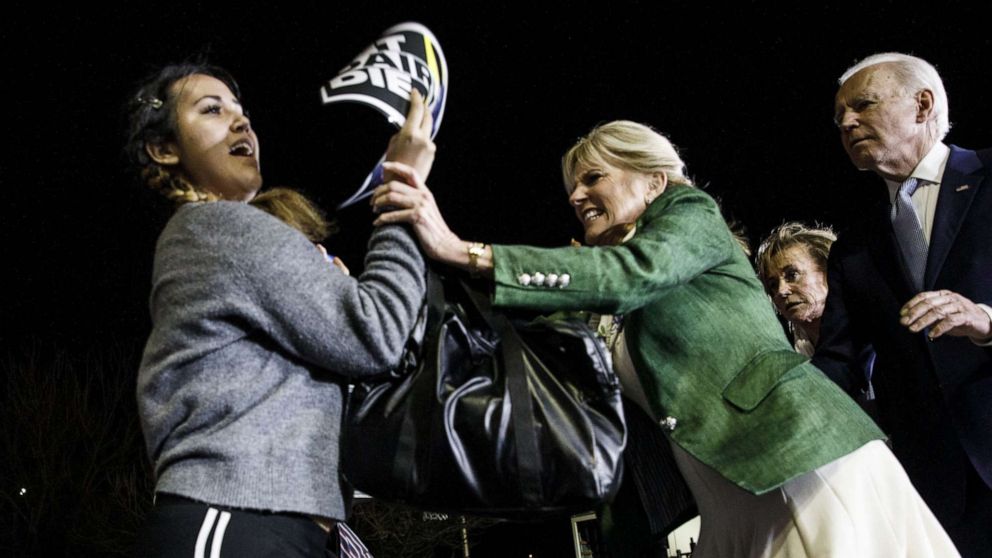 PHOTO: Jill Biden blocks a protester from arriving on stage during an primary night rally for former Vice President Joe Biden in Los Angeles, March 3, 2020.