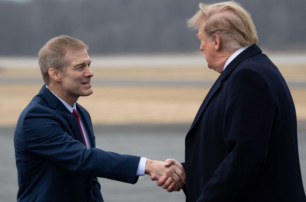 PHOTO: President Donald Trump shakes hands with Rep. Jim Jordan as he disembarks from Air Force One upon arrival at Lima Allen County Airport in Lima, Ohio, March 20, 2019.