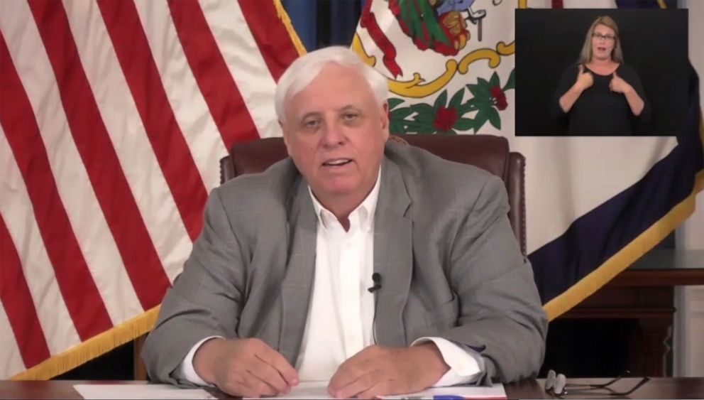 PHOTO: This image provided by West Virginia governors office, Gov. Jim Justice holds a news conference regarding the COVID-19 epidemic, May 29, 2020 in Charleston, W.Va.