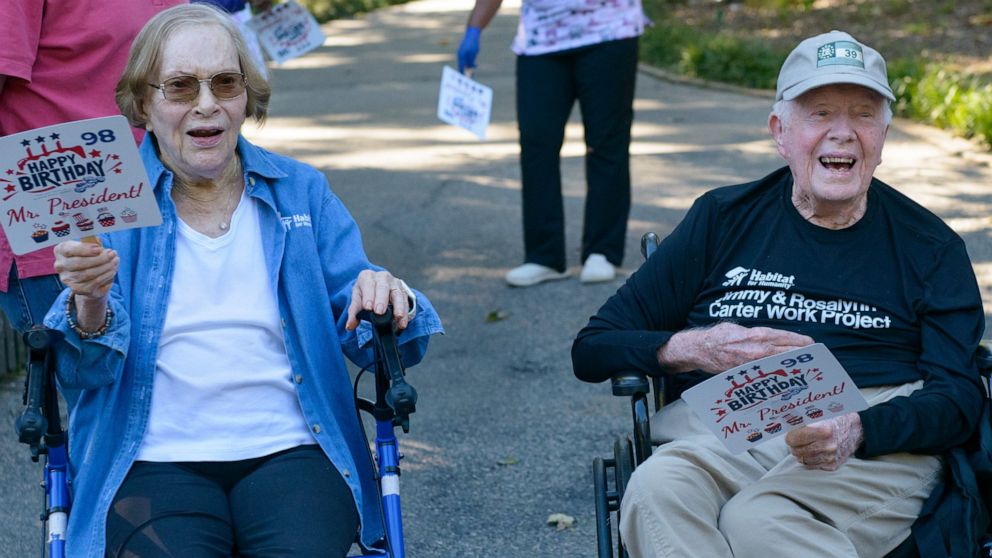 Former President Jimmy Carter and his wife, Rosalynn Carter, appeared at the Plains Peanut Festival, seven months after starting hospice.