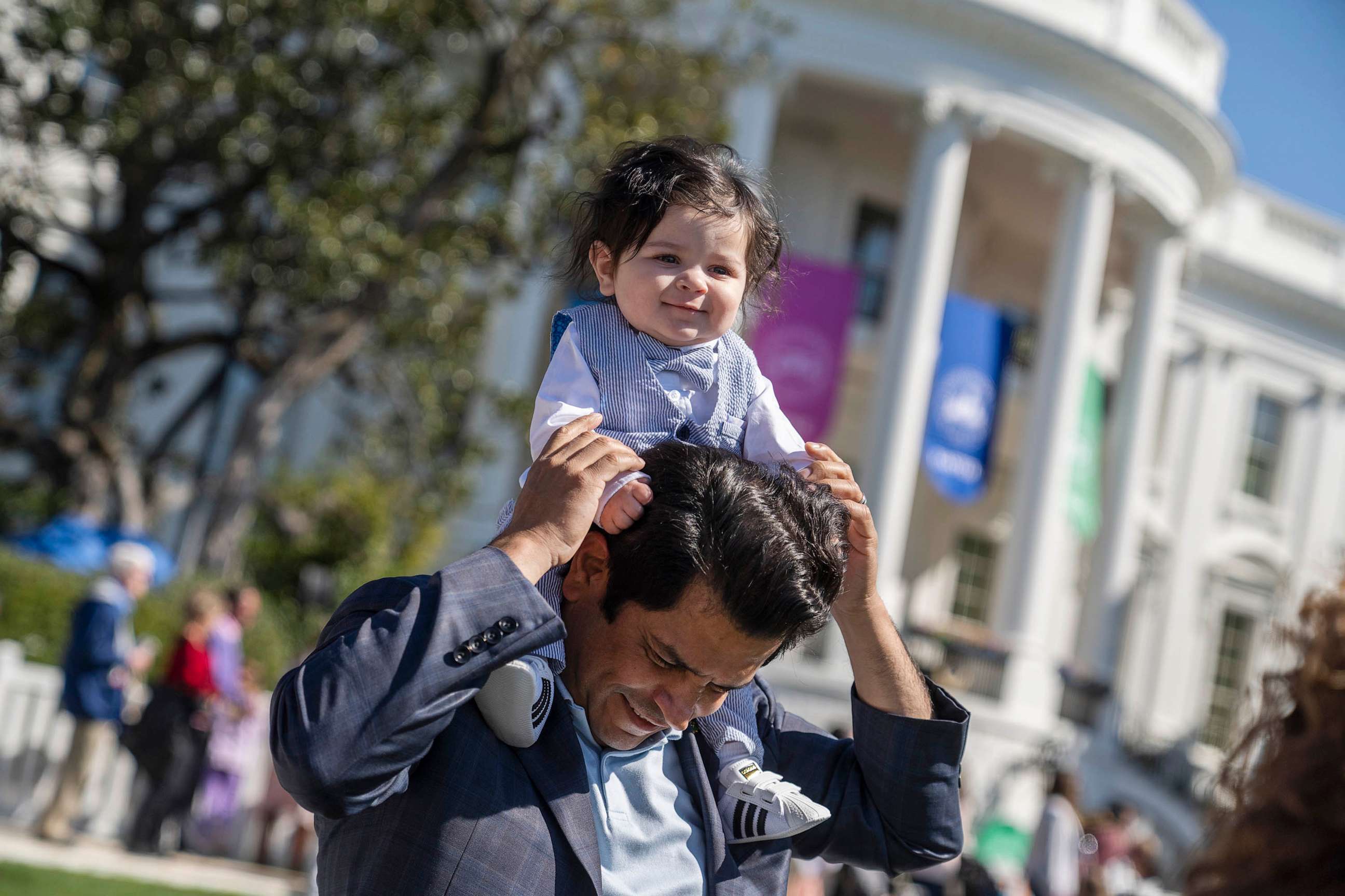 PHOTO: FILE - Rep. Jimmy Gomez and his son Hodge, 7 months, are seen on the South Lawn during the White House Easter Egg Roll, April 10, 2023.