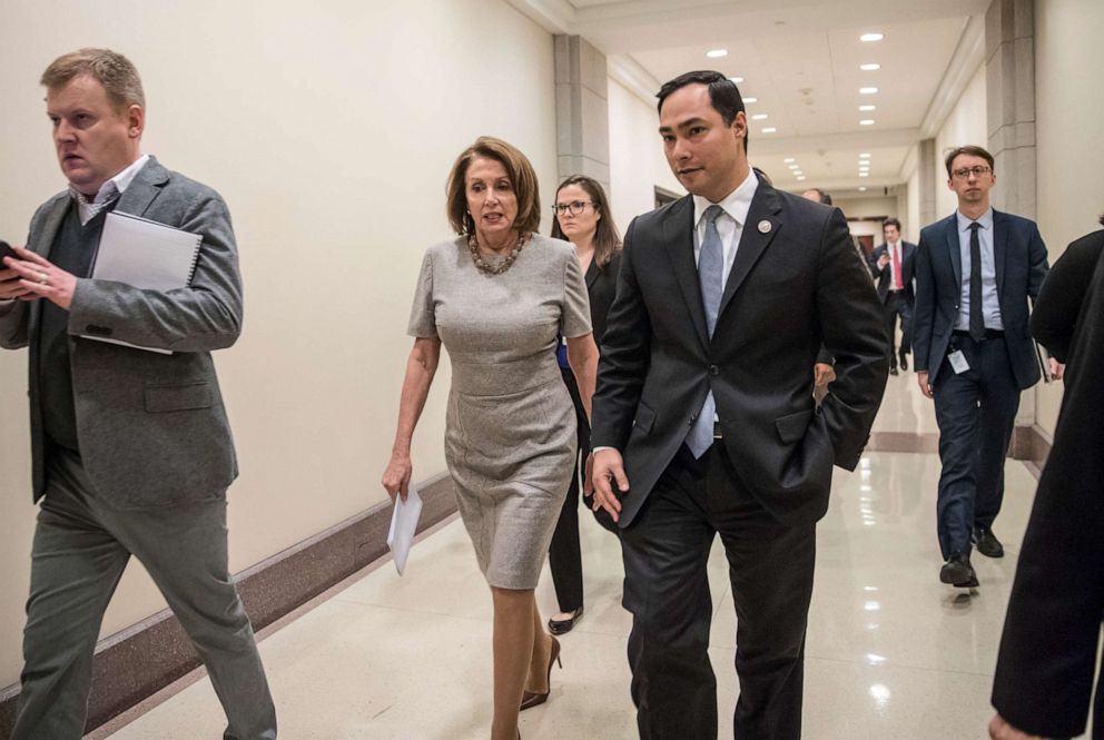 PHOTO: House Minority Leader Nancy Pelosi of Calif. walks with Rep. Joaquin Castro, Feb. 16, 2017, on Capitol Hill in Washington.