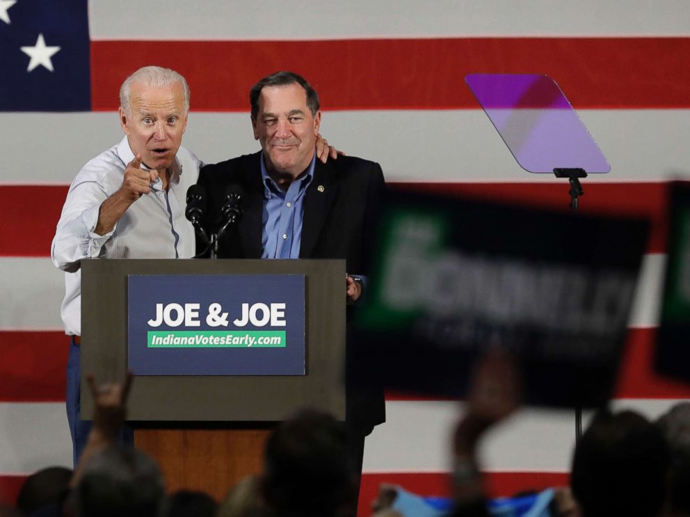 PHOTO: Former Vice President Joe Biden, left, and Democratic Senator Joe Donnelly express at a rally, on October 12, 2018, in Hammond, in the Ind.