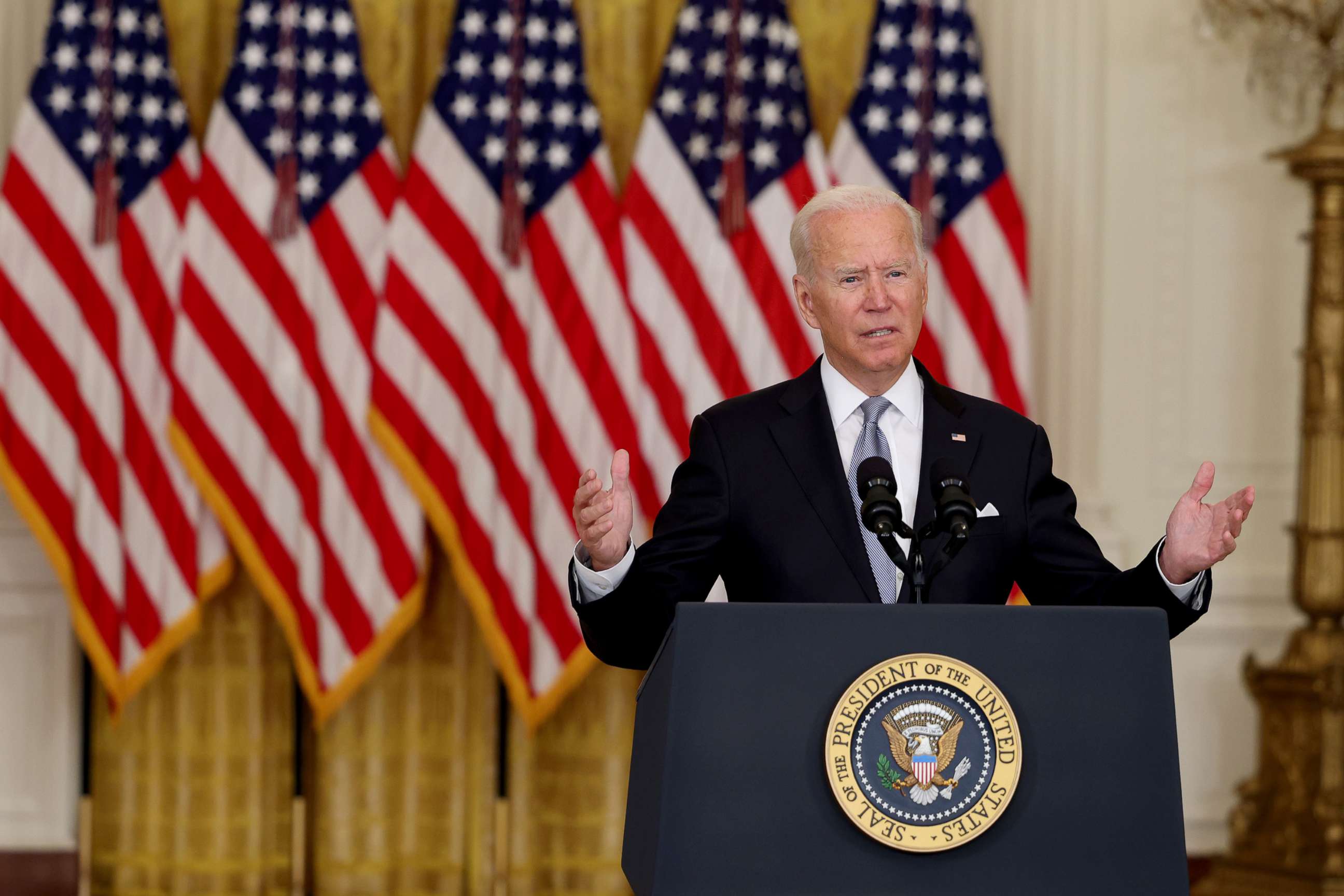 PHOTO: President Joe Biden gestures as he gives remarks on the worsening crisis in Afghanistan from the East Room of the White House, Aug. 16, 2021, in Washington.