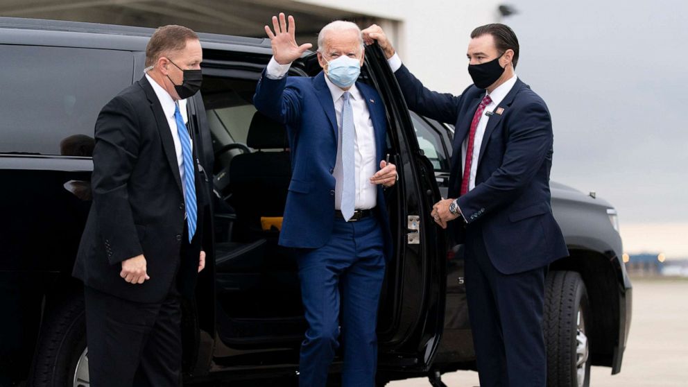 PHOTO: Democratic presidential candidate former Vice President Joe Biden arrives to board his campaign plane at New Castle Airport in New Castle, Oct. 27, 2020, to travel to Georgia for rallies.