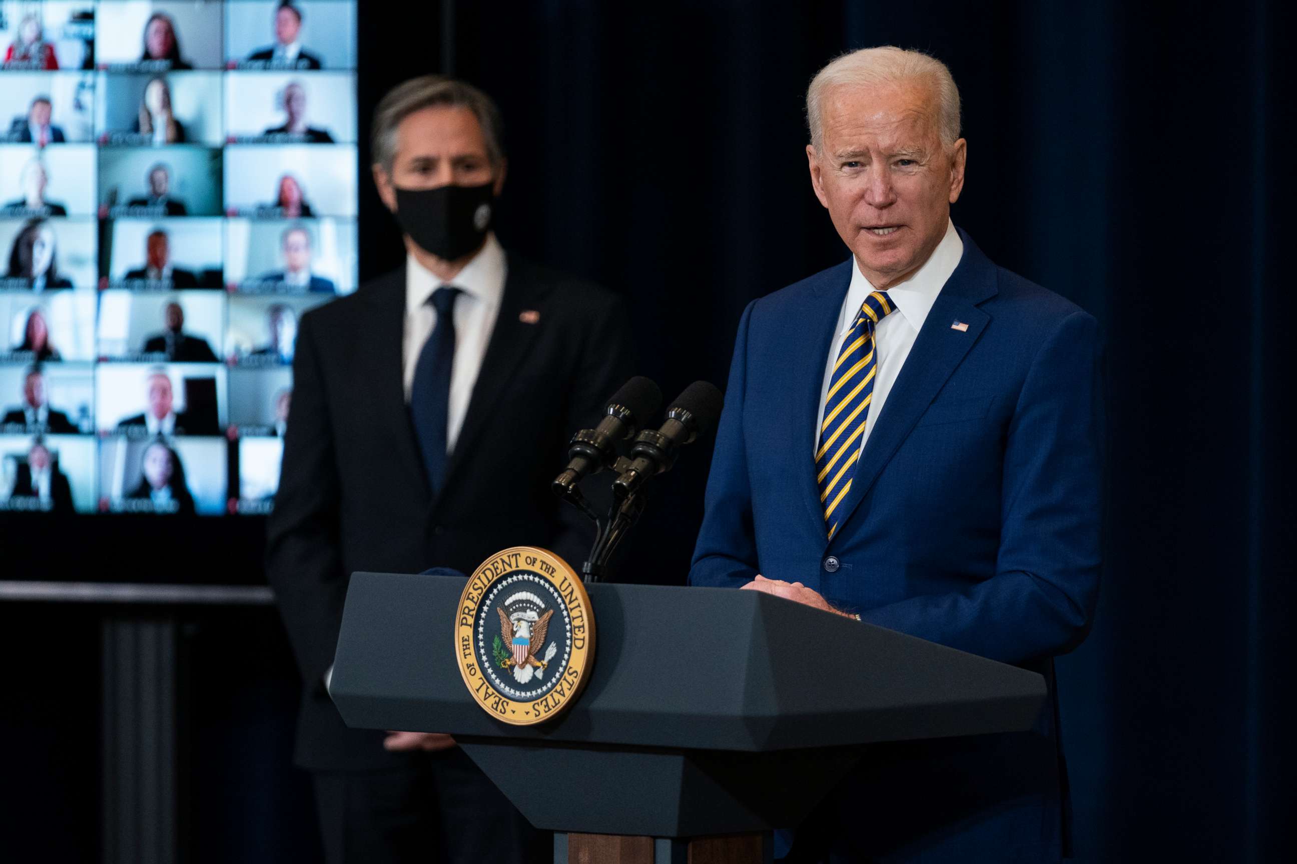 PHOTO: Secretary of State Anthony Blinken listens as President Joe Biden delivers remarks to State Department staff, Feb. 4, 2021, in Washington.