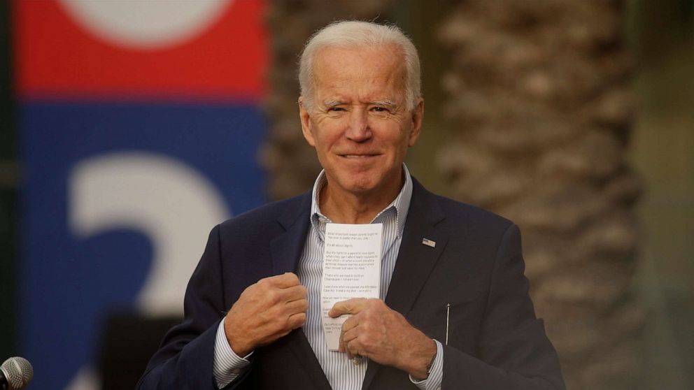 PHOTO: Democratic presidential candidate former Vice President Joe Biden saves his speech notes at the end of a campaign rally at Los Angeles Trade Technical College in Los Angeles, Nov. 14, 2019.