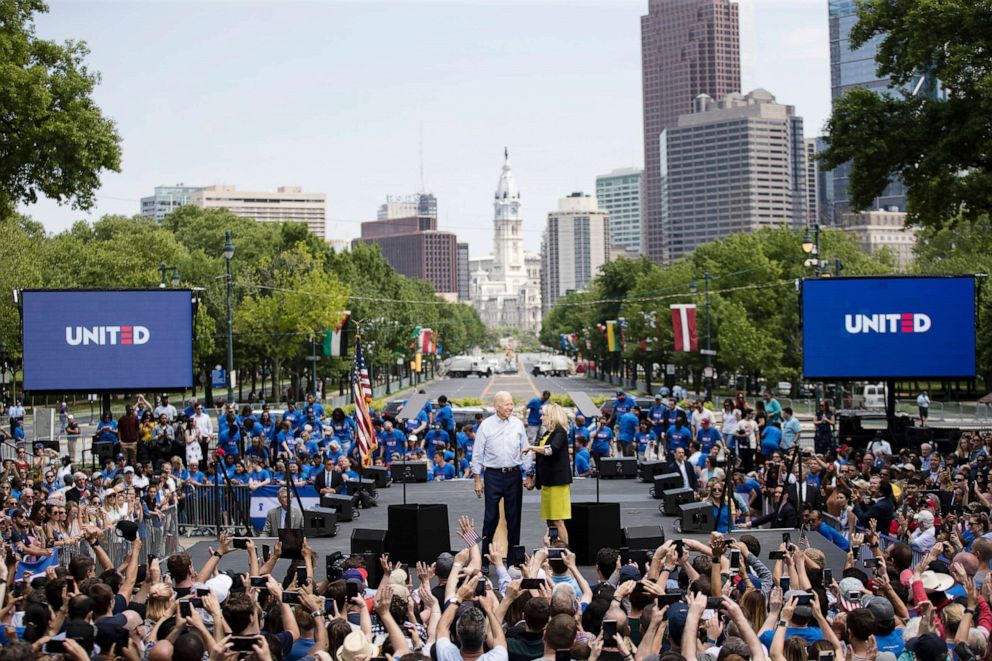 PHOTO: Democratic presidential candidate, former Vice President Joe Biden stands with his wife Jill at the end of a campaign rally in Philadelphia.