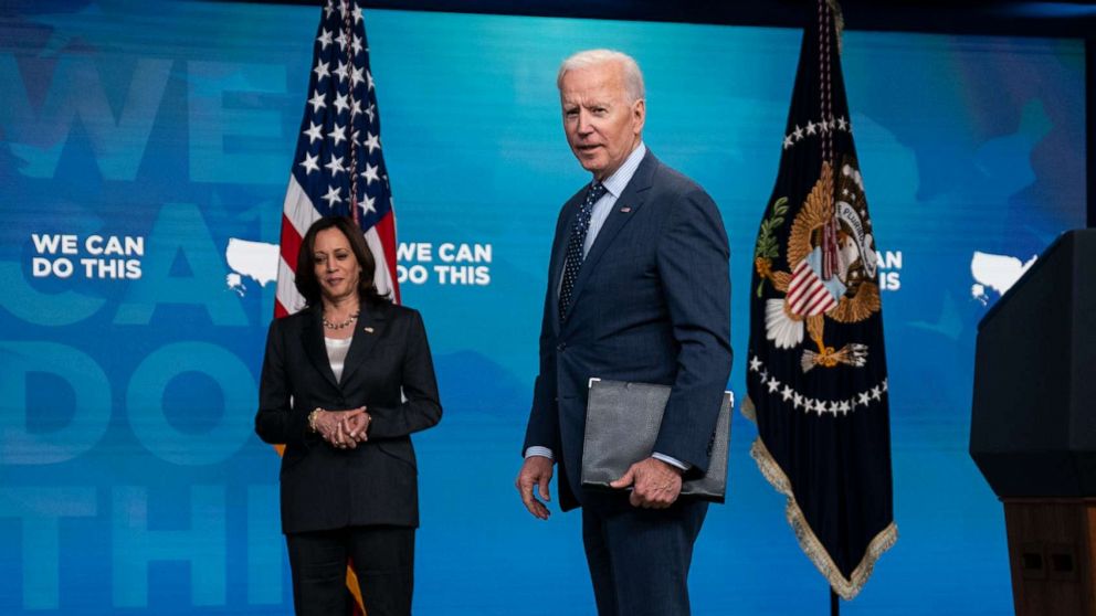 PHOTO: Vice President Kamala Harris listens as President Joe Biden answers a question after speaking about the COVID-19 vaccination program, in the South Court Auditorium on the White House campus, June 2, 2021, in Washington.