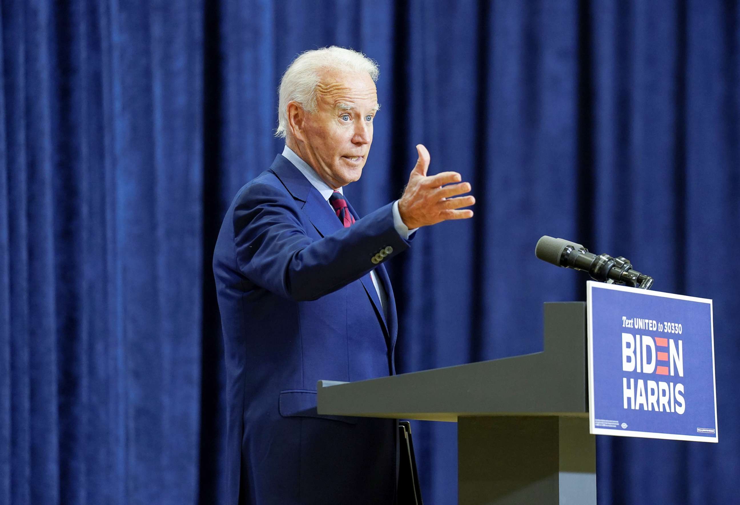 PHOTO: Democratic U.S. presidential nominee Joe Biden answers questions from reporters  during an appearance in Wilmington, Del., Sept. 4, 2020.