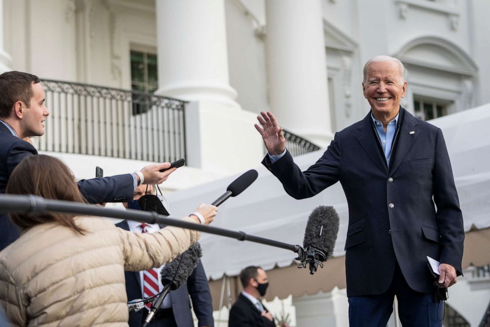 PHOTO: President Joe Biden speaks to reporters as he walks to Marine One on the South Lawn of the White House, Dec. 15, 2021, in Washington.