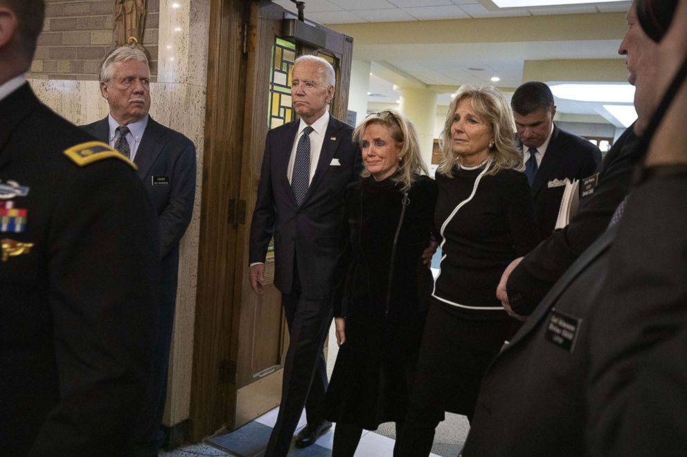 PHOTO: Congresswoman Debbie Dingell arrives with former Vice President Joe Biden and his wife Jill Biden, for the funeral of her husband former congressman John Dingell at the Church of the Divine Child on Feb. 12, 2019, in Dearborn, Mich.