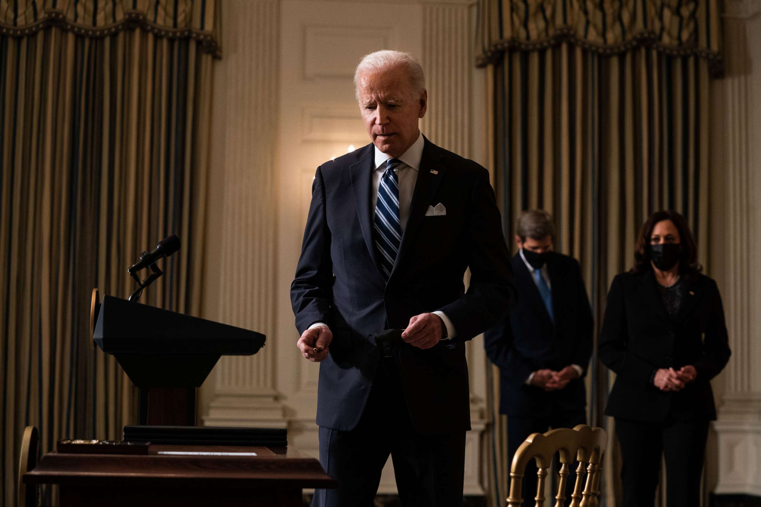 PHOTO: President Joe Biden prepares to sign executive orders after speaking about climate change issues in the State Dining Room of the White House on Jan. 27, 2021, in Washington, D.C.