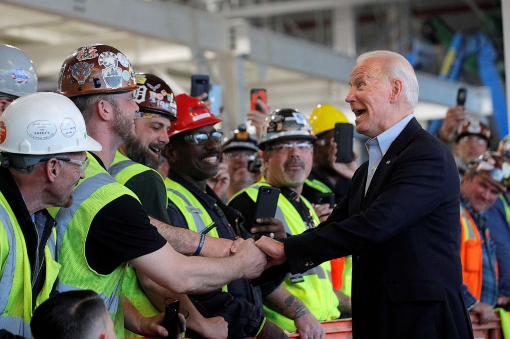 PHOTO: Democratic presidential candidate and former Vice President Joe Biden greets workers during a campaign stop at the FCA Mack Assembly plant in Detroit, March 10, 2020.