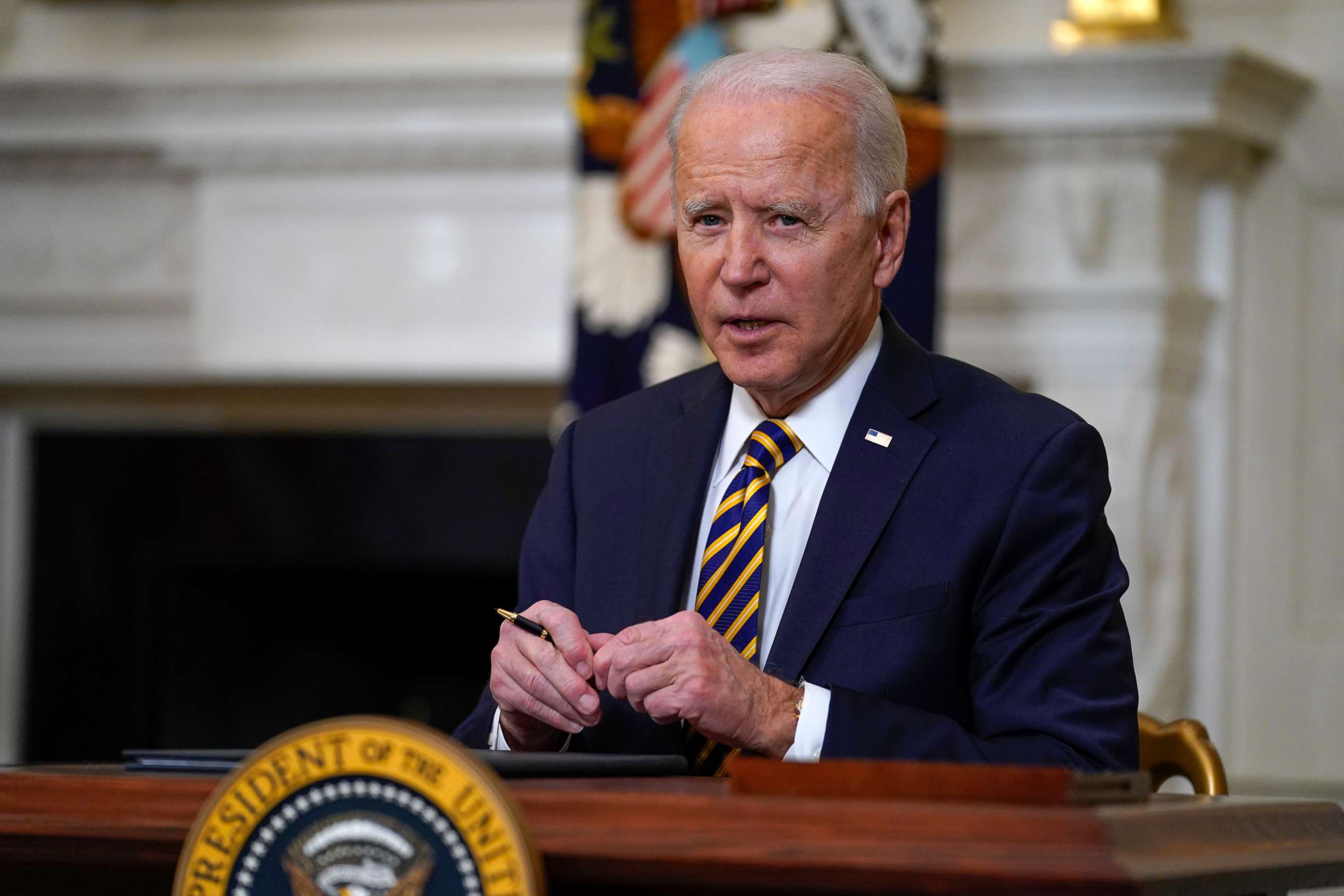 PHOTO: U.S. President Joe Biden pauses after signing an executive order relating to U.S. supply chains in the State Dining Room of the White House in Washington, D.C., on Feb. 24, 2021.