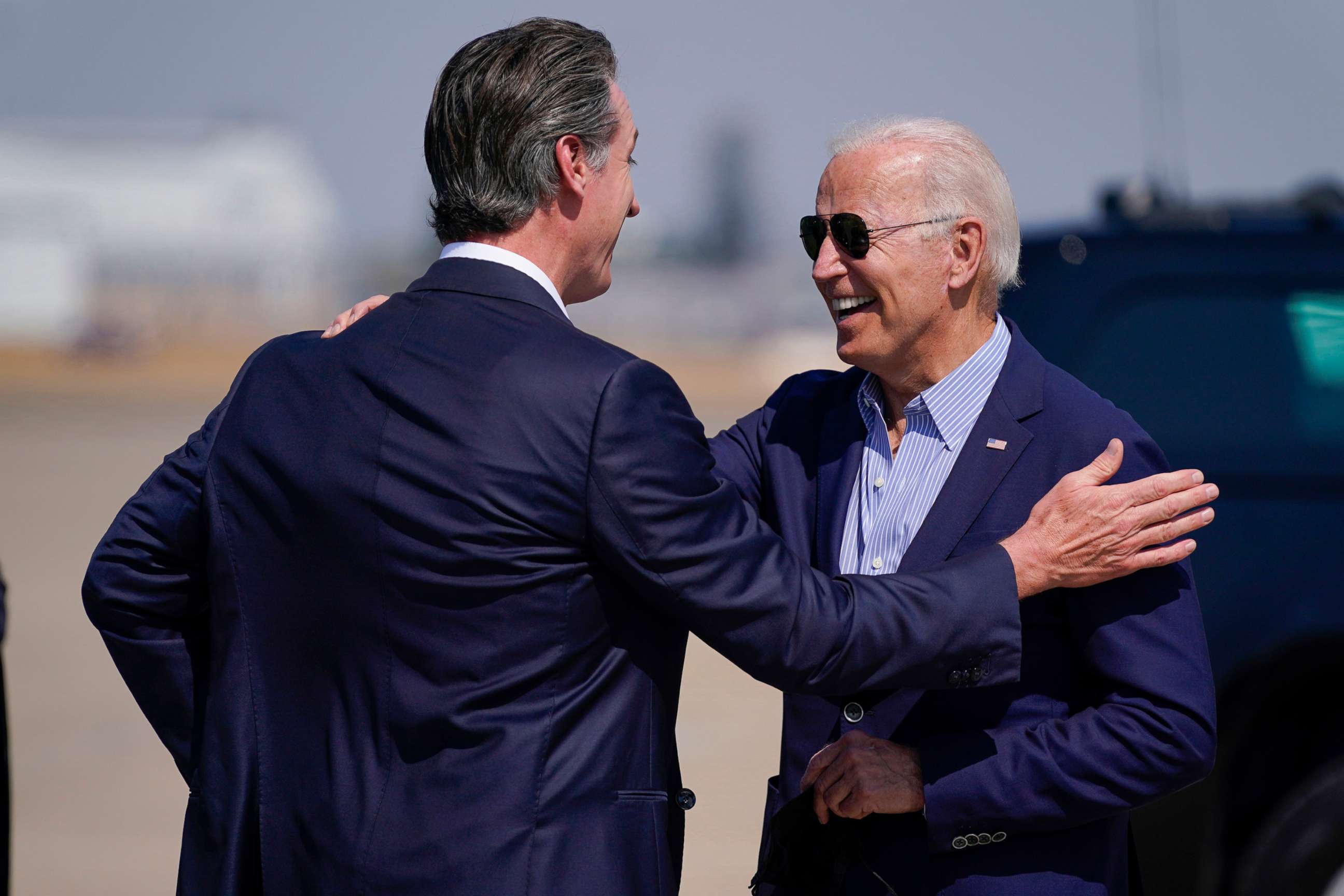 PHOTO: President Joe Biden talks with California Gov. Gavin Newsom as he arrives at Mather Airport on Air Force One, Sept. 13, 2021, in Mather, Calif.