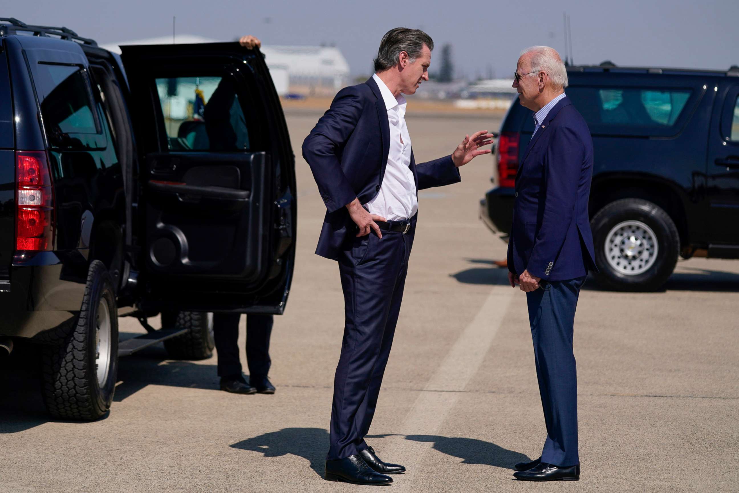 PHOTO: President Joe Biden talks with California Gov. Gavin Newsom as he arrives at Mather Airport on Air Force One, Sept. 13, 2021, in Mather, Calif.