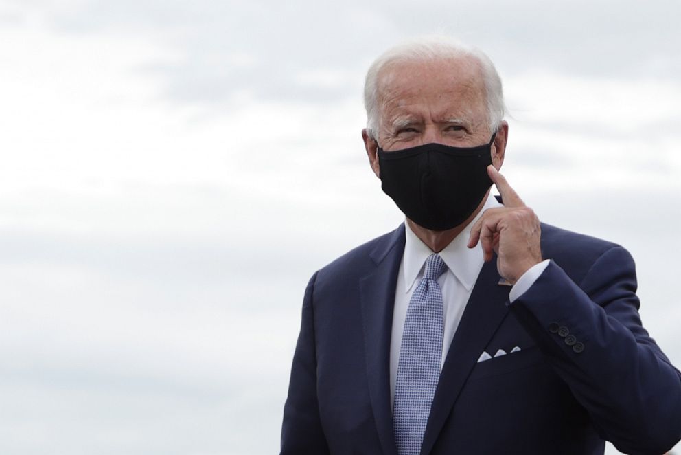 PHOTO: Former Vice President Joe Biden gestures after he landed at Allegheny County Airport on Aug. 31, 2020, in West Mifflin, Pa.