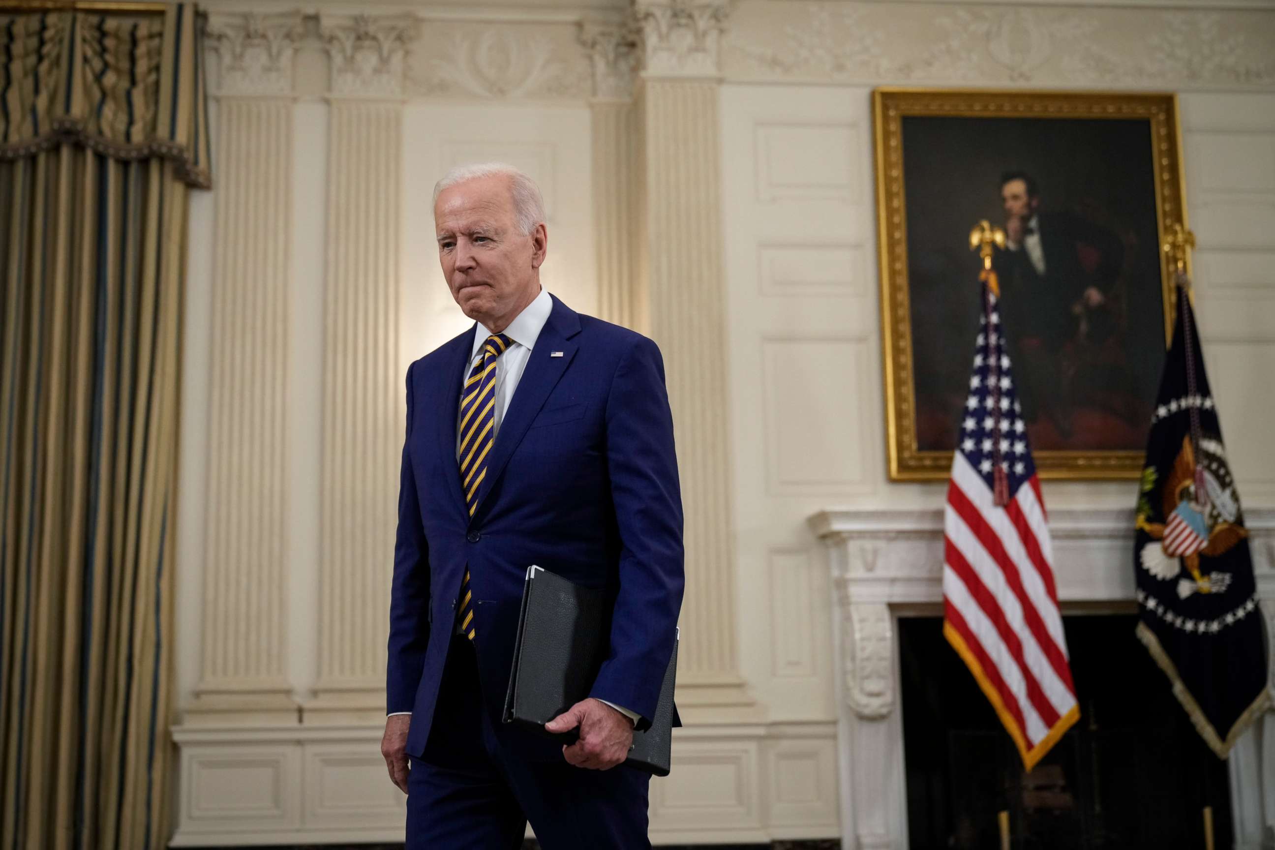 PHOTO: President Joe Biden departs after speaking about the nation's COVID-19 response and the vaccination program in the State Dining Room of the White House on June 18, 2021, in Washington.