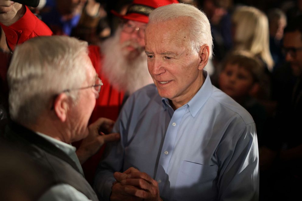 PHOTO: Democratic presidential candidate Joe Biden talks with supporters during a campaign event at the Prairie Hill Pavilion, Jan. 27, 2020, in Marion, Iowa.