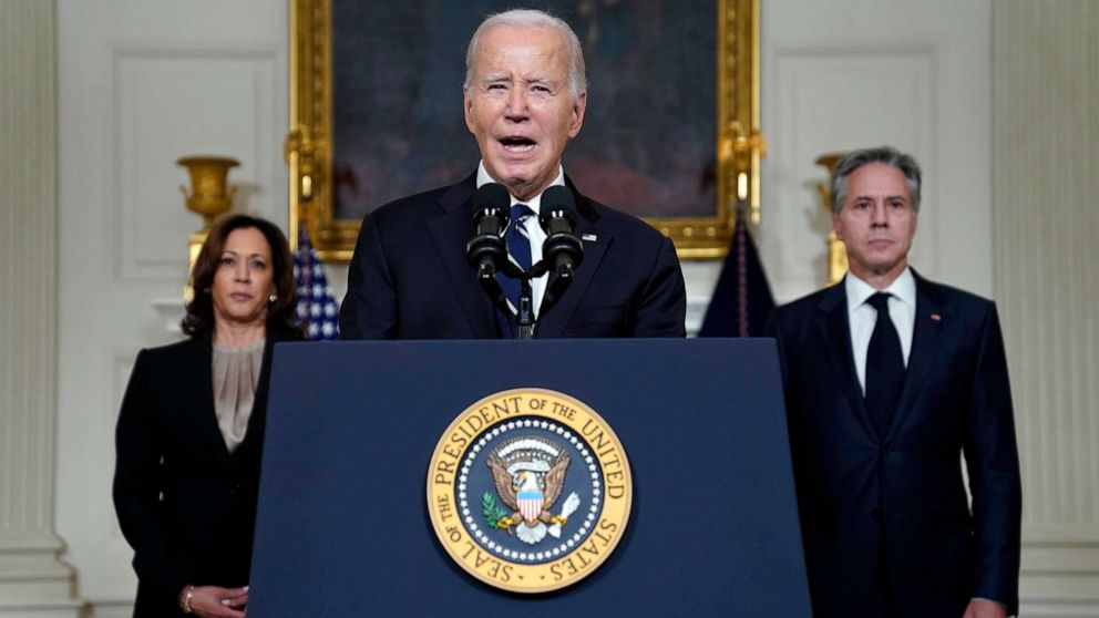 PHOTO: President Joe Biden speaks, Oct. 10, 2023, in the State Dining Room of the White House in Washington, about the war between Israel and the militant Palestinian group Hamas, as Vice President Kamala Harris and Secretary of State Antony Blinken liste