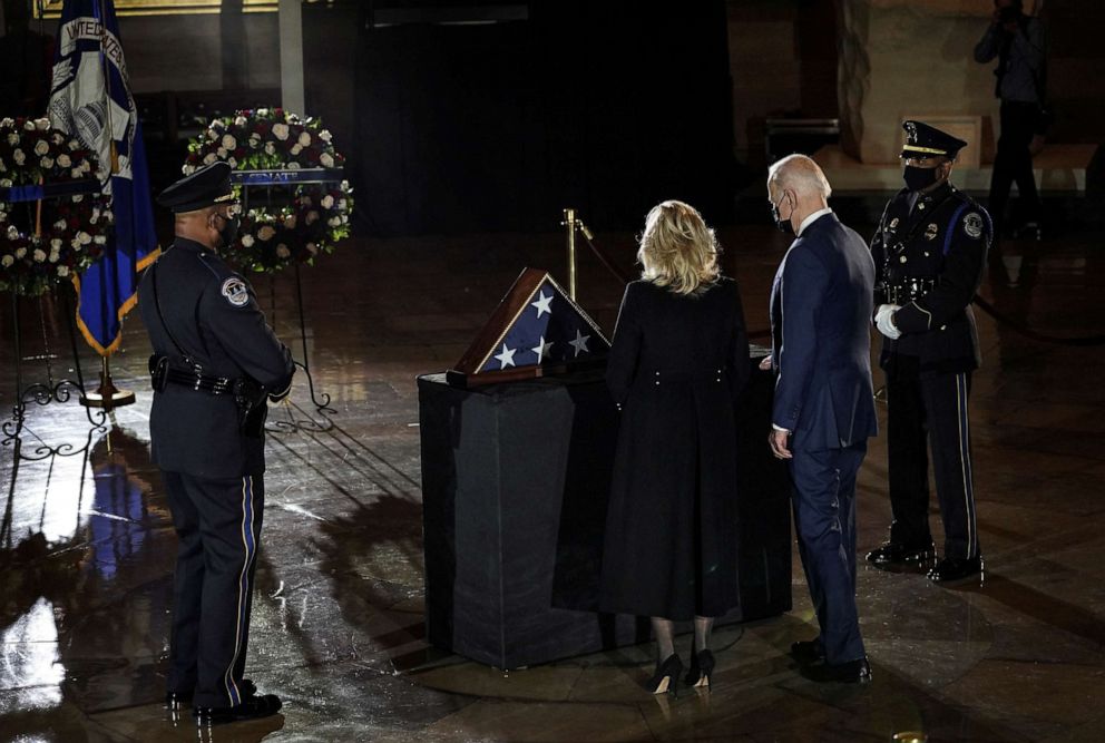 PHOTO: President Joe Biden and first lady Dr. Jill Biden pay their respects to U.S. Capitol Police Officer Brian D. Sicknick, 42, as he lies in honor in the Capitol Rotunda in Washington, D.C., Feb. 2, 2021. 