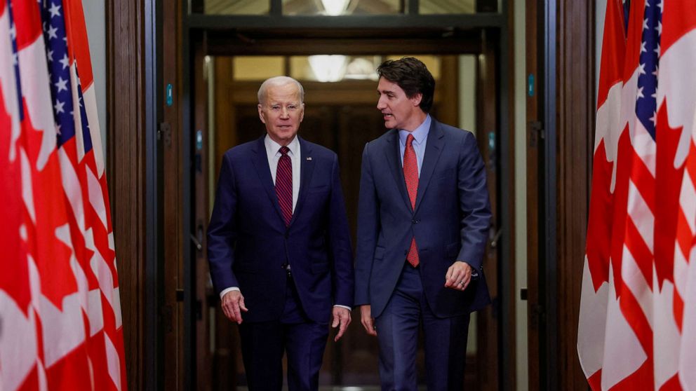 PHOTO: U.S. President Joe Biden walks with Canadian Prime Minister Justin Trudeau on Parliament Hill, March 24, 2023, in Ottawa, Ontario, Canada.