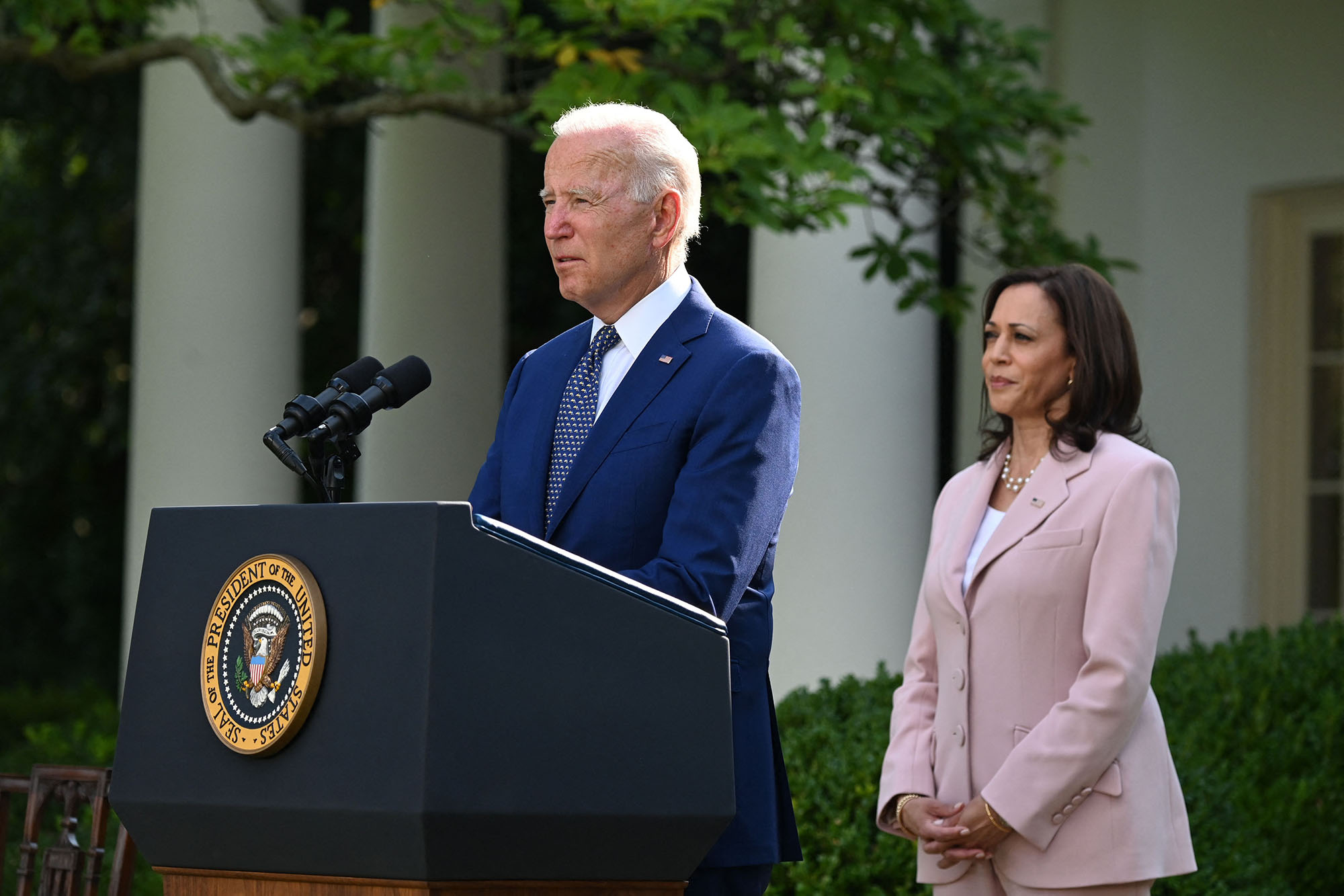 PHOTO: Vice President Kamala Harris listens to President Joe Biden in the Rose Garden of the White House in Washington, Aug. 5, 2021.