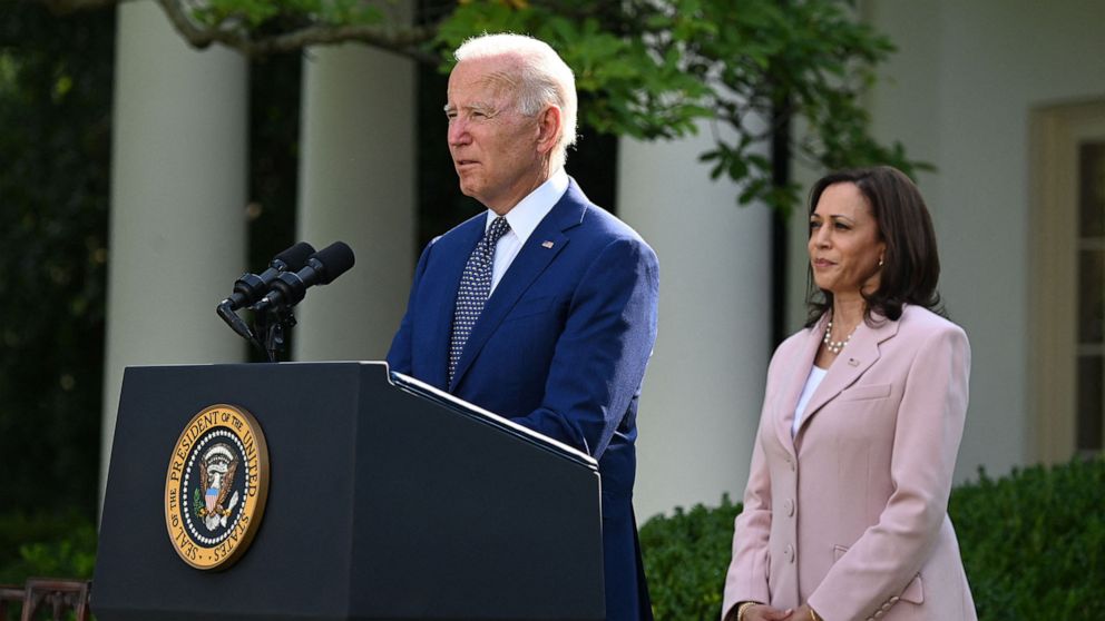 PHOTO: Vice President Kamala Harris listens to President Joe Biden in the Rose Garden of the White House in Washington, Aug. 5, 2021.