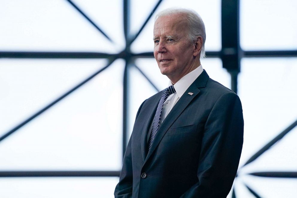 PHOTO: President Joe Biden listens as Ambassador Caroline Kennedy speaks before Biden about the cancer moonshot initiative at the John F. Kennedy Library and Museum in Boston, Sept. 12, 2022.