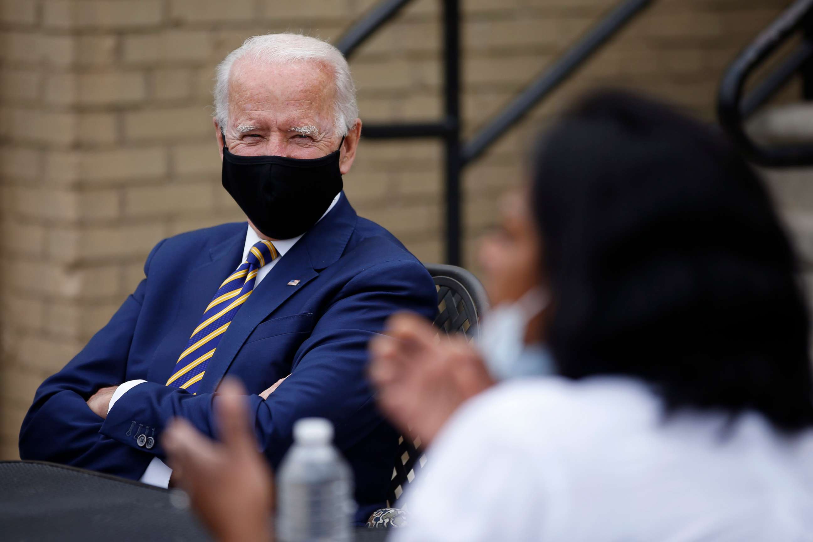 PHOTO: Democratic presidential candidate, former Vice President Joe Biden, left, listens as Carlette Brooks, owner of Carlette's Hideaway, a soul food restaurant, talks during a meeting with small business owners, Wednesday, June 17, 2020, in Yeadon, Pa.