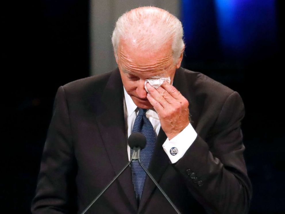 PHOTO: Former Vice President Joe Biden wipes a tear while giving a tribute during memorial service at North Phoenix Baptist Church for Sen. John McCain, Aug. 30, 2018, in Phoenix, Arizona.