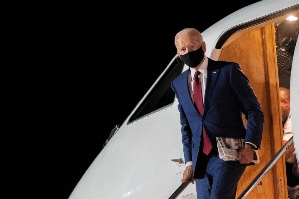 PHOTO: Democratic presidential nominee and former Vice President Joe Biden disembarks his plane at New Castle Airport upon returning from Wisconsin campaign events, in New Castle, Del., on Sept. 21, 2020.