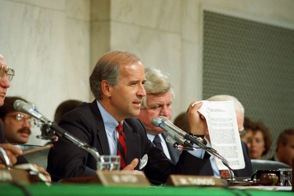 PHOTO: Senate Judiciary Committee Chairman Joseph Biden holds up a copy of the FBI report on Anita Hill during committee hearings on Capital Hill about her allegations against Judge Clarence Thomas.