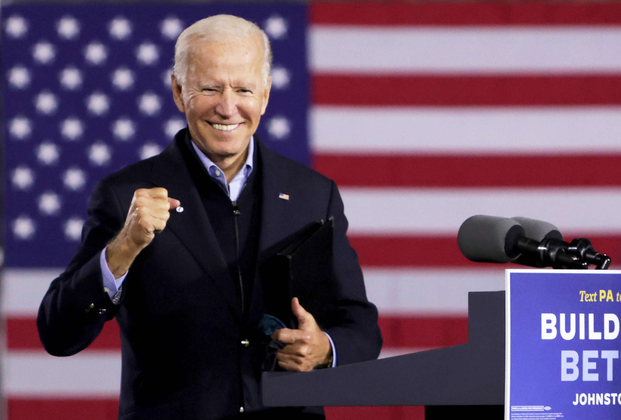 PHOTO: Democratic presidential nominee Joe Biden gestures during a campaign stop outside Johnstown Train Station in Johnstown, Penn., Sept. 30, 2020.
