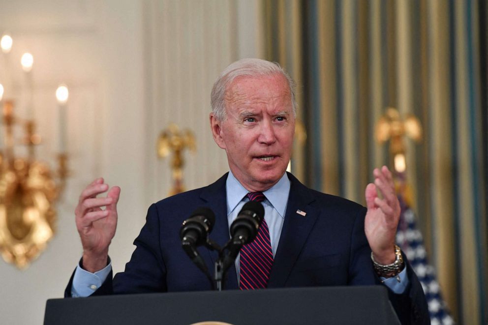 PHOTO: President Joe Biden gestures as he delivers remarks on the debt limit from the State Dining Room of the White House on Oct. 4, 2021, in Washington.