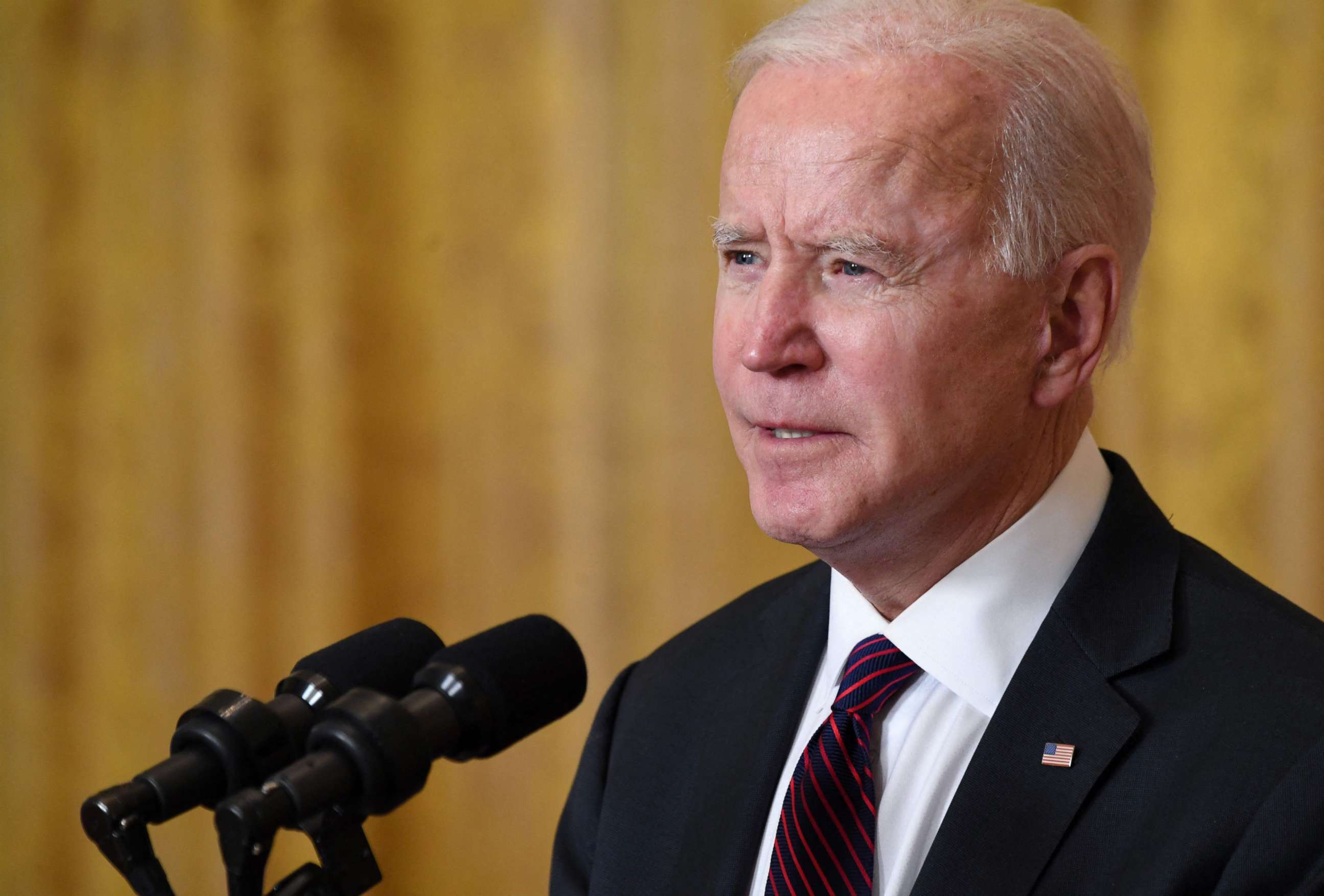 PHOTO: President Joe Biden speaks to reporters in the East Room of the White House on Feb. 23, 2021. 