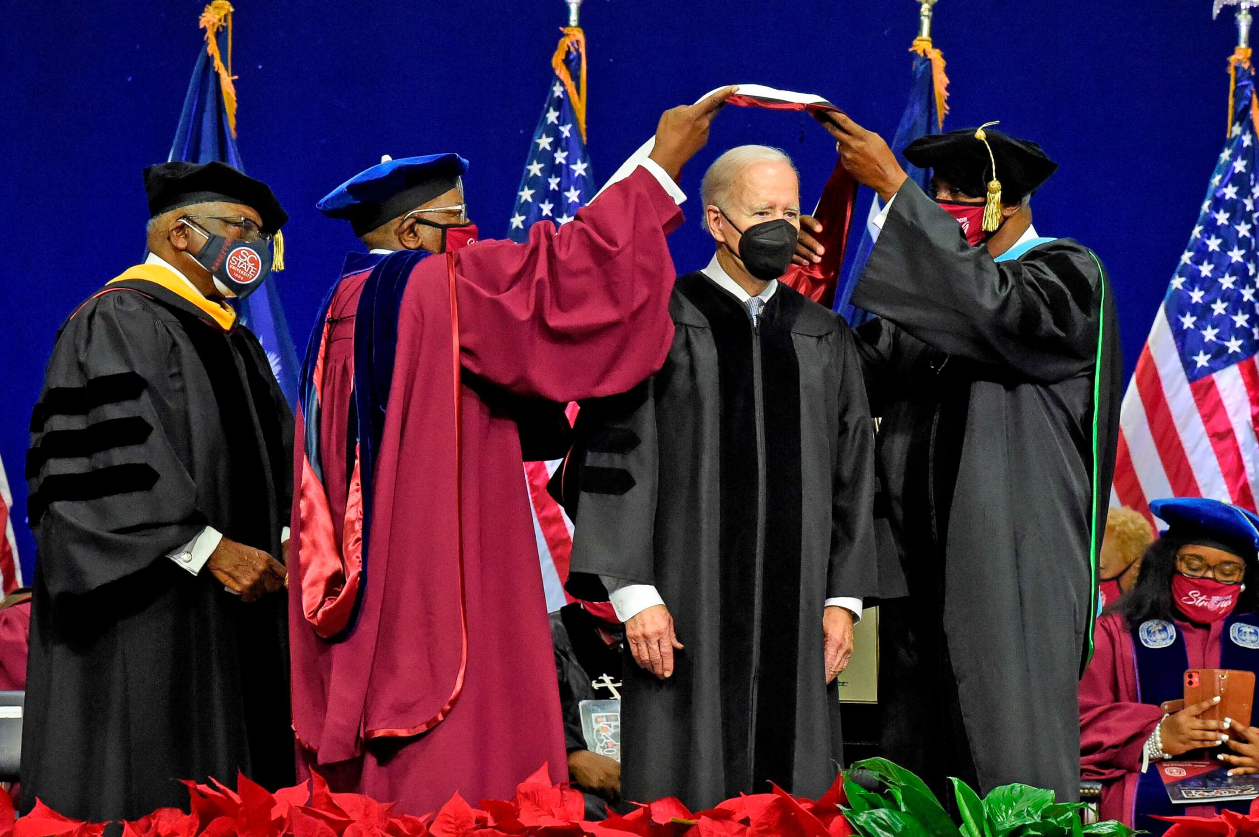 PHOTO: House Majority Whip Jim Clyburn looks on as President Joe Biden receives an honorary degree after speaking at South Carolina State University's 2021 Fall Commencement Ceremony in Orangeburg, S.C., Dec. 17, 2021.
