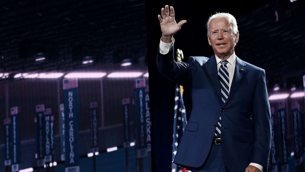 PHOTO: Former vice president and Democratic presidential nominee Joe Biden waves on stage at the end of the third day of the Democratic National Convention at the Chase Center in Wilmington, Del., on Aug. 19, 2020.