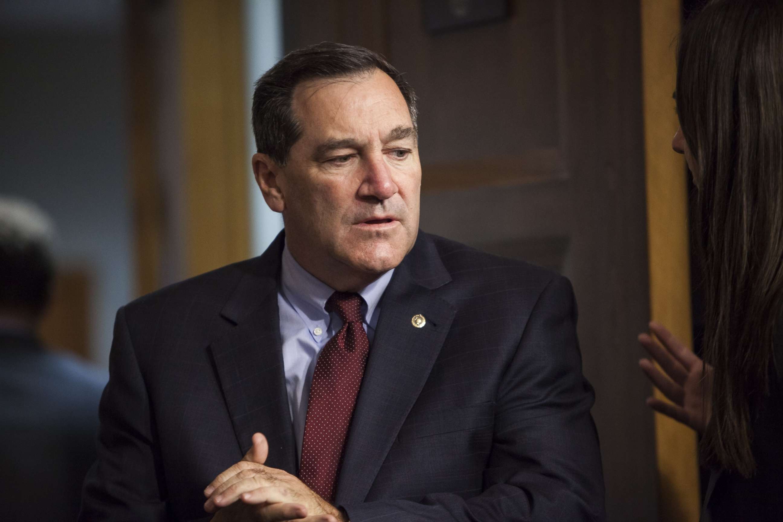 PHOTO: Sen. Joe Donnelly enters the hearing chamber before a Senate Armed Services Committee hearing on Counter-ISIL Strategy in Washington, July 7, 2015.