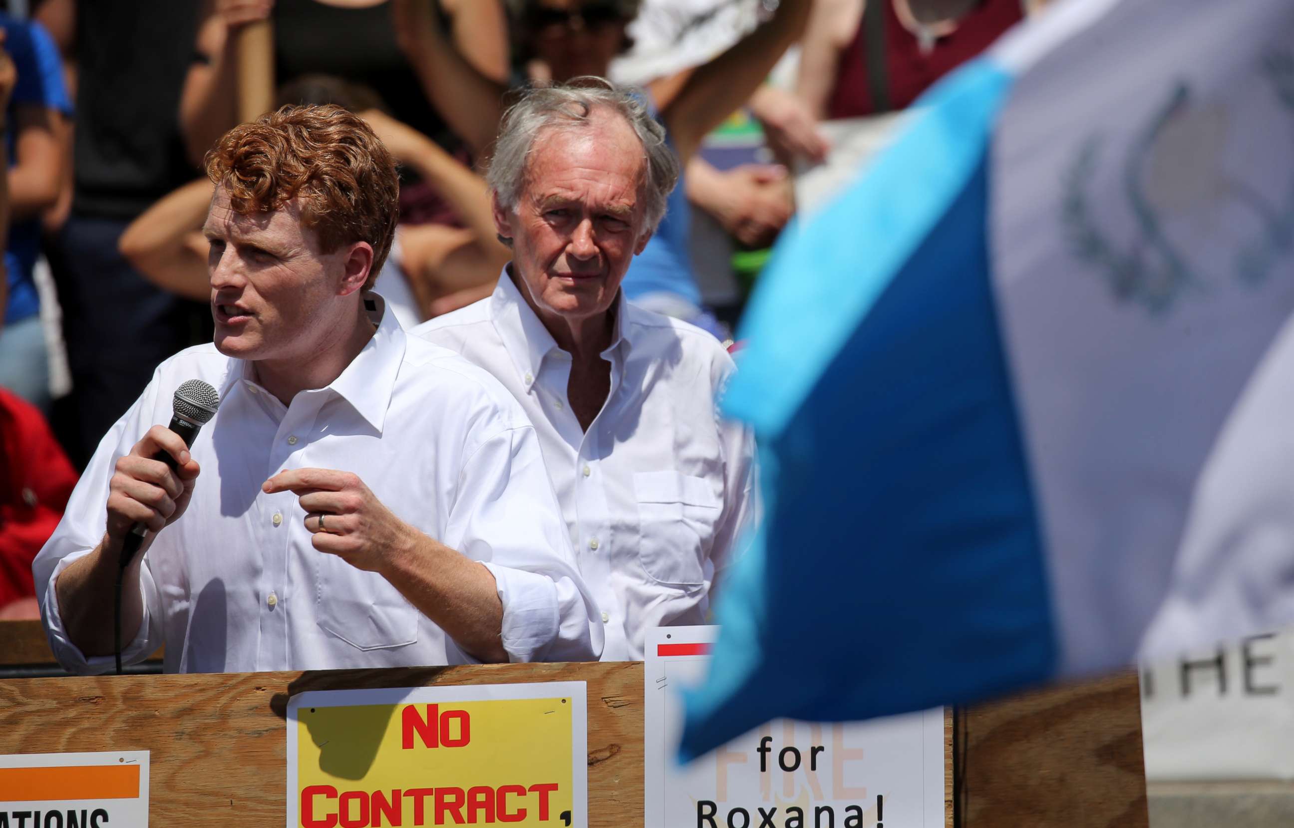 PHOTO: Congressman Joe Kennedy, left, and Sen. Edward Markey speak to demonstrators during the Together and Free Rally Against Family Separation at City Hall Plaza in Boston, June 30, 2018. 