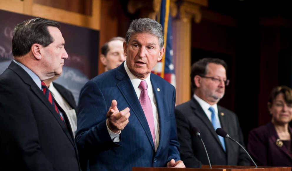 PHOTO: Sen. Joe Manchin participates in the Senate Democrats news conference on tax reform in the Capitol, Nov. 28, 2017.