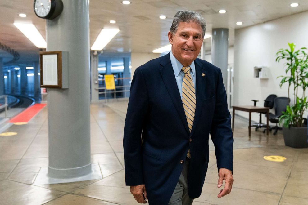 PHOTO: Sen. Joe Manchin walks near the Senate subway on Capitol Hill in Washington, June 22, 2021.