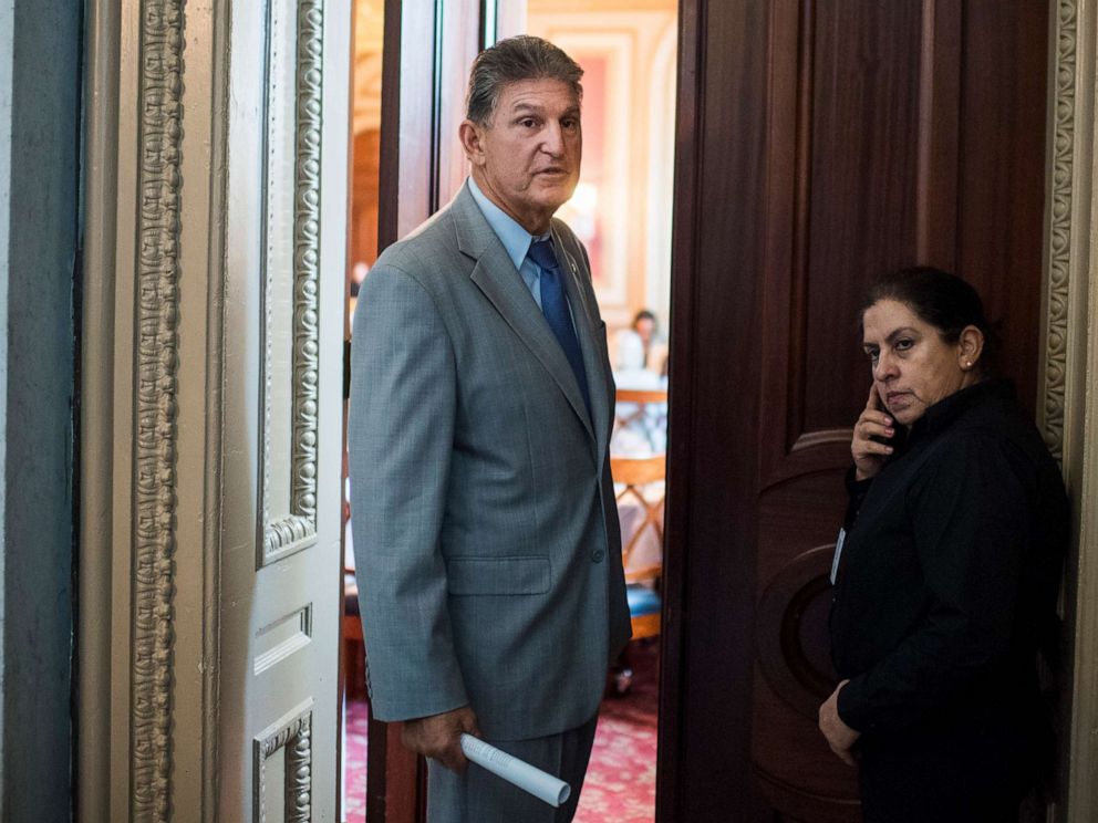 PHOTO: Sen. Joe Manchintalks with reporters after a vote in the Capitol, Sept. 12, 2019.