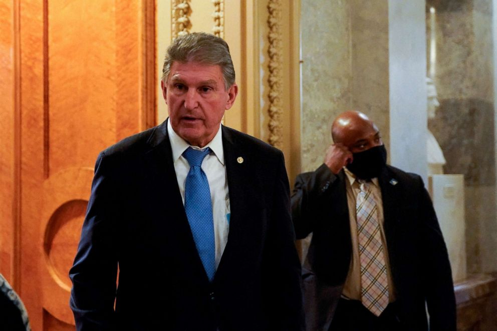 PHOTO: Senator Joe Manchin leaves the Senate floor after a vote at the U.S. Capitol building in Washington, Dec. 9, 2021.