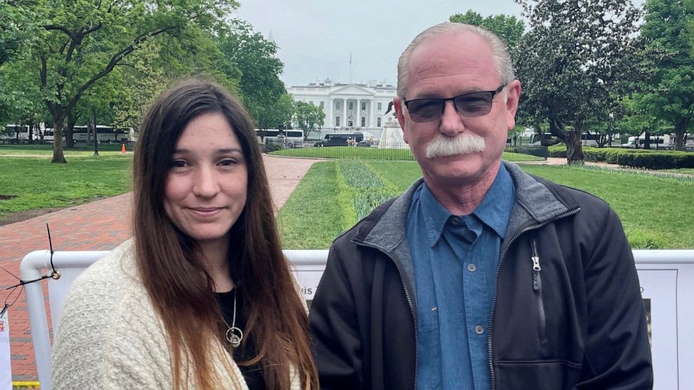 PHOTO: Released detainee Trevor Reed's father Joey and his sister Taylor Reed pose for a photograph, while gathering with families of other detainees outside the White House in Washington, D.C. May 4, 2022.