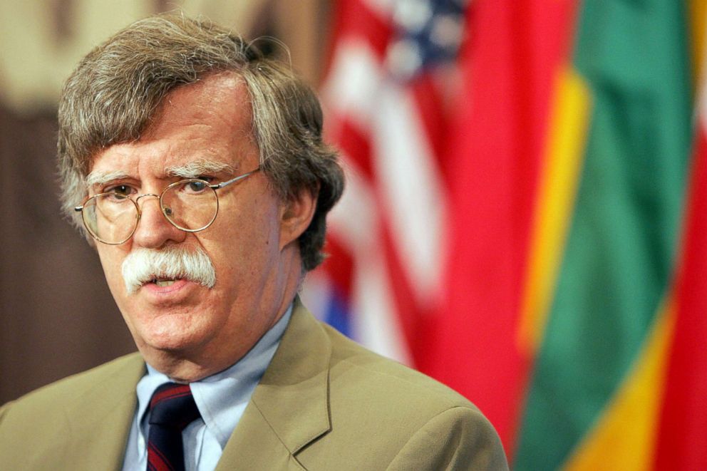 PHOTO: United States Ambassador to the United Nations John Bolton speaks to reporters outside the Security Council chambers, July 12, 2006, at the United Nations in New York. 
